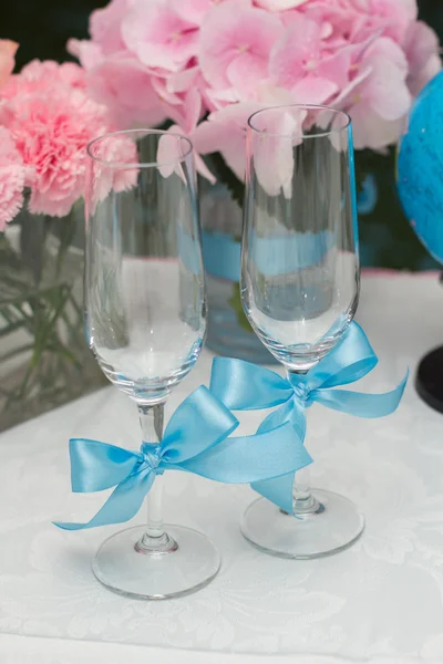 Wedding Table Decoration. Table set for a wedding dinner. Beautiful flowers on table in wedding day.