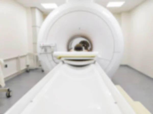 Blurred abstract background Medical computed tomography or MRI or PET in the laboratory of a modern hospital. Technologically advanced and functional medical examination of the patient...