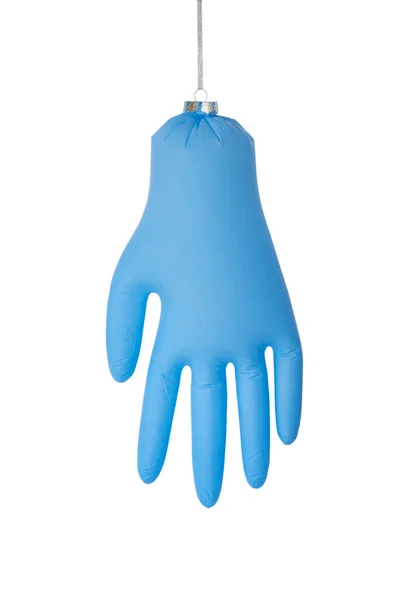 Christmas toys as a medical glove isolated, concept...
