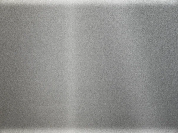 Fond ou texture en aluminium brossé. Texture abstraite fond, lumière brillante sur le mur métallique gris — Photo