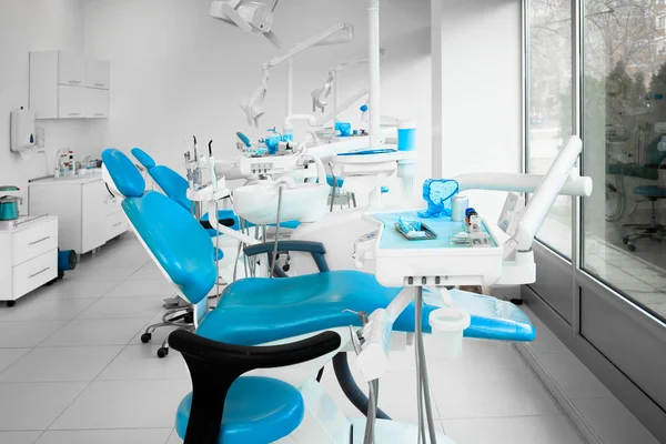 Interior of a modern dentist office with brand new dentist chairs