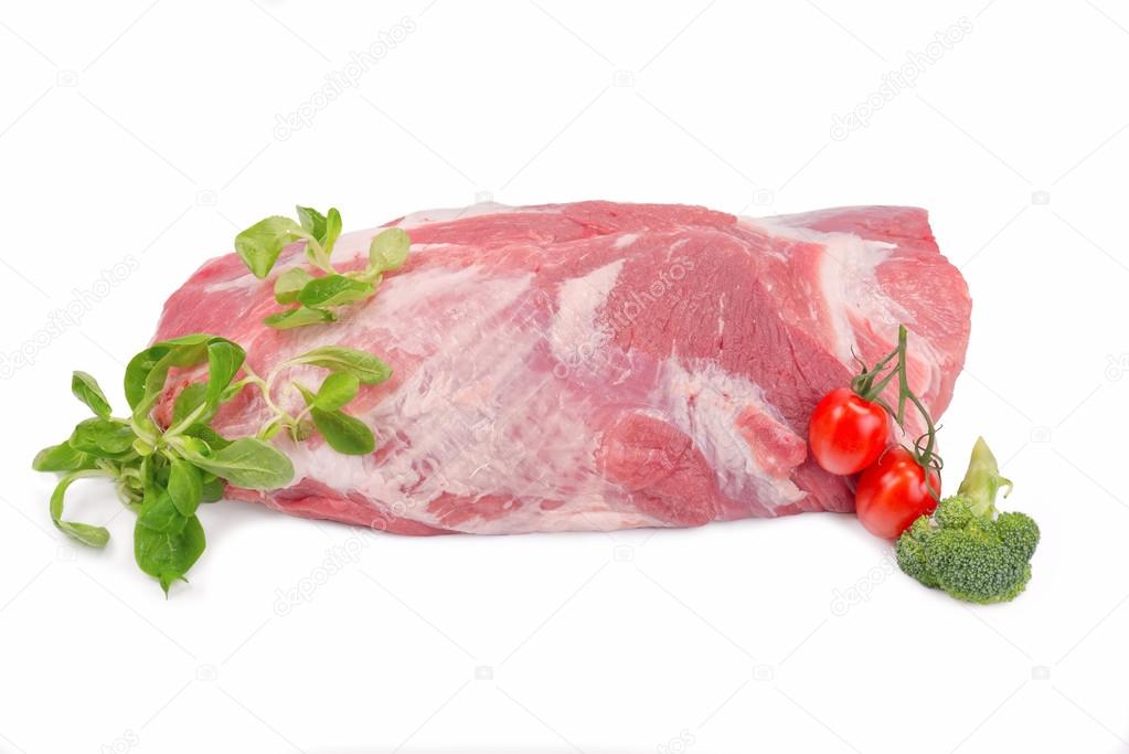 pork shoulder on the white background with greens