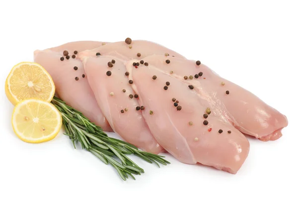 Chicken breast fillet skinless on the white background with greens Stock Image
