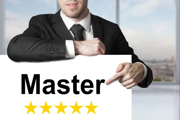 Businessman pointing on sign master gold stars — Stock Photo, Image