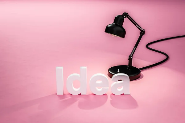 Industry Style Desk Lamp Pink Colored Surface Lettering Idea Concept — Stock Photo, Image