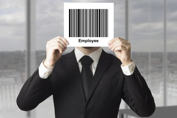 Businessman hiding face behind sign barcode employee — Stock Photo, Image