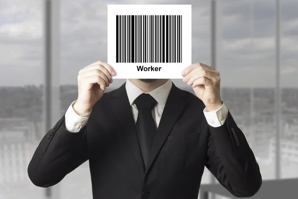 Uomo d'affari nascosto faccia dietro barcode lavoratore — Foto Stock