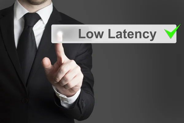 Businessman pushing button low latency — Stock Photo, Image