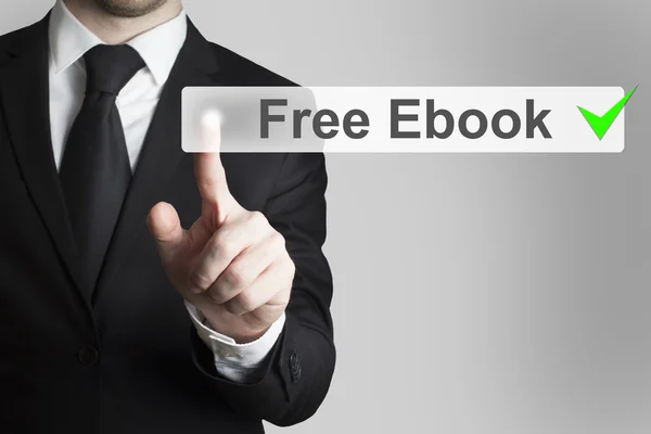 Hombre de negocios pulsando el botón plano ebook gratis — Foto de Stock