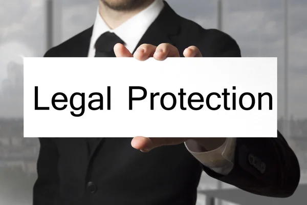 Businessman showing sign legal protection — Stock Photo, Image