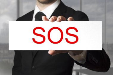 sos tutan işadamı imzalamak