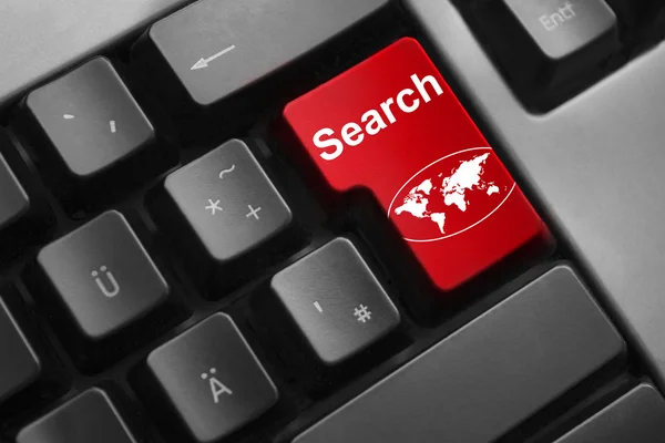 Dark keyboard red enter button search world symbol — Stock Photo, Image