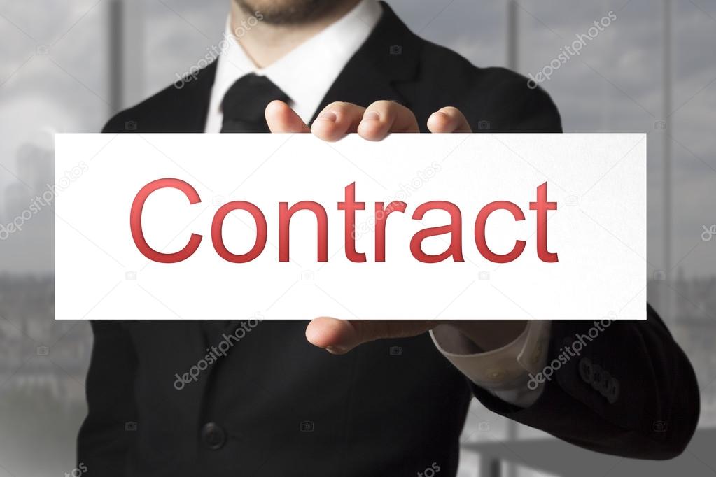 businessman showing sign contract