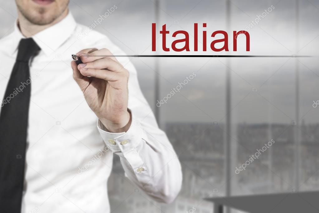 businessman writing italian in the air language