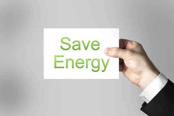 Hand holding sign save energy — Stock Photo, Image