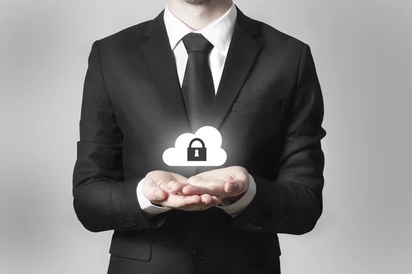 Geschäftsmann serviert Geste Cloud Sicherheitssymbol — Stockfoto