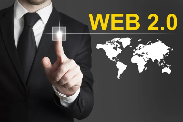 Businessman pushing button web internet — Stock Photo, Image
