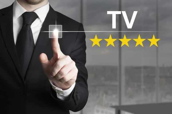 Businessman pushing button tv star rating — Stock Photo, Image