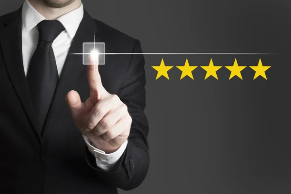 Businessman pushing button five star rating — Stock Photo, Image
