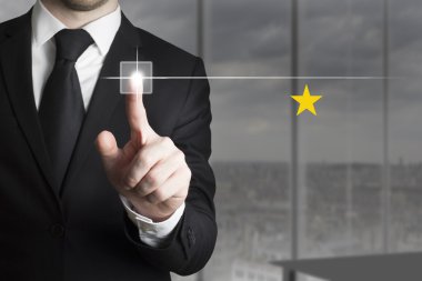 düğme bir yıldızlı derece iterek işadamı