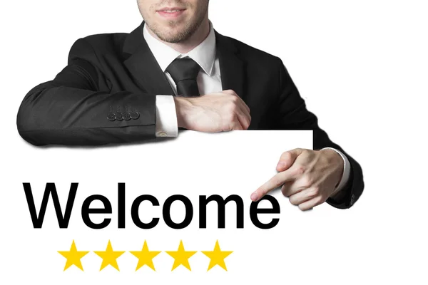 Businessman pointing on sign welcome — Stock Photo, Image