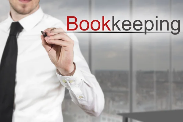 Businessman writing bookkeeping in the air — Stock Photo, Image