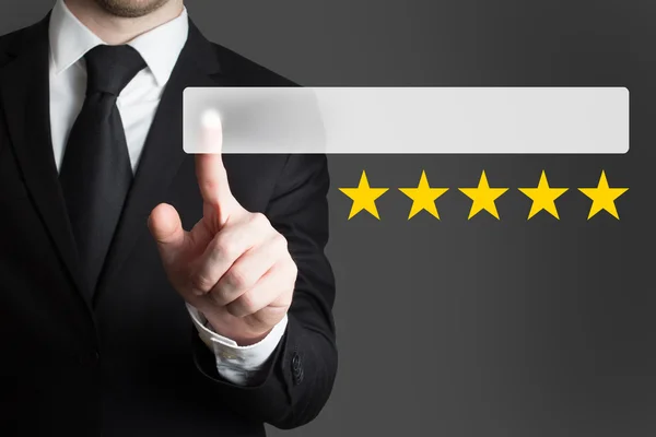 Businessman pushing button five rating stars — Stock Photo, Image