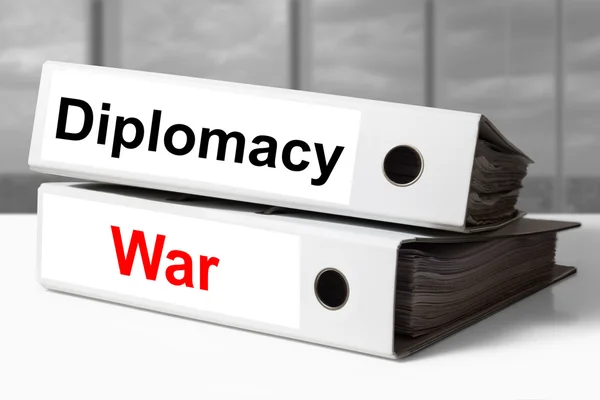 Stack of office binders diplomacy war — Stock Photo, Image