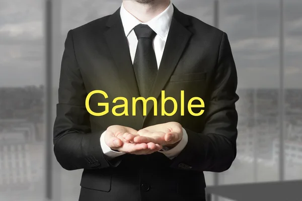 Zakenman bedelen gebaar gok — Stockfoto