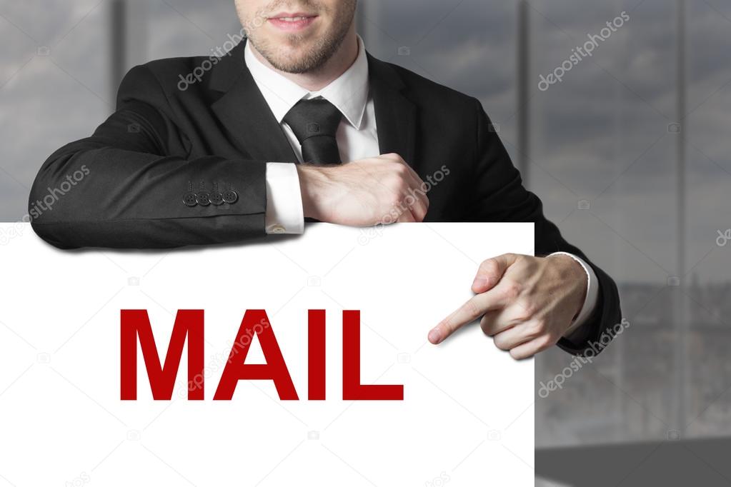 businessman pointing on sign mail