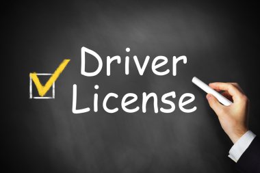 hand writing driver license on black chalkboard checkbox clipart