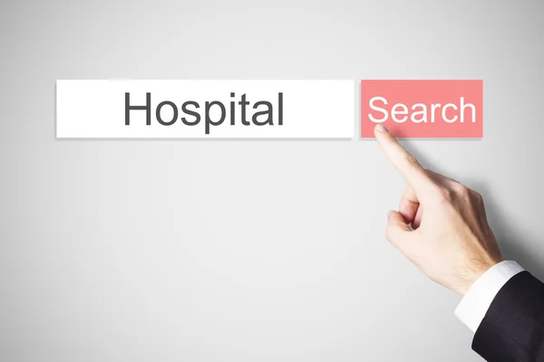 Businessmans hand pressing browser search button hospital — Stock Photo, Image