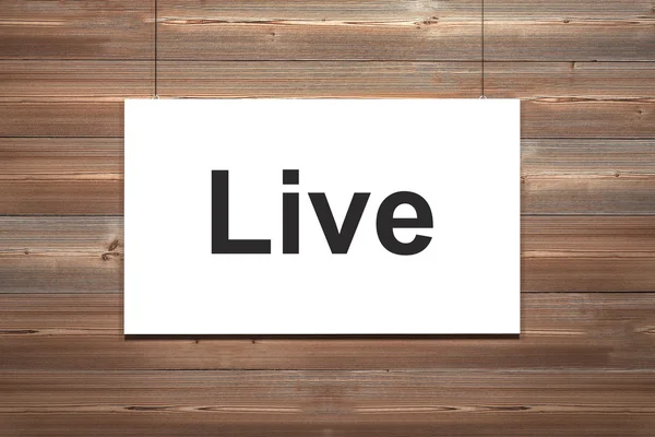 White canvas on wooden wall live — Stock Photo, Image