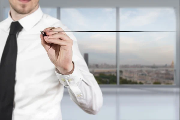 Businessman in office drawing line in the air — Stock Photo, Image