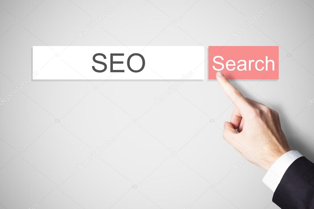 finger pushing red web search button seo
