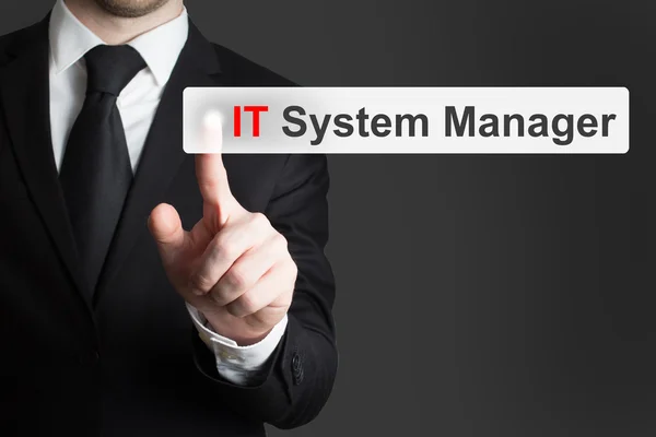 Businessman pressing touchscreen button it system manager — стоковое фото