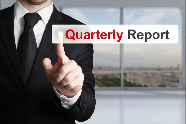 Businessman pushing button quarterly report — Stock Photo, Image