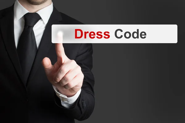 Businessman pushing button dress code — Stock Photo, Image