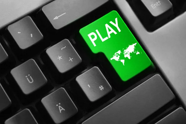 Keyboard with green enter key play international — Stock Photo, Image