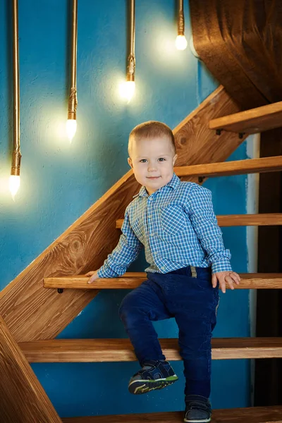 Cute Little Boy Standing Wooden Staircase Beautiful Light Bulbs Blue Stock Picture