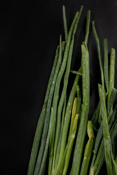 Green Onion Tips Garlic Scapes Black Background — Stock Photo, Image