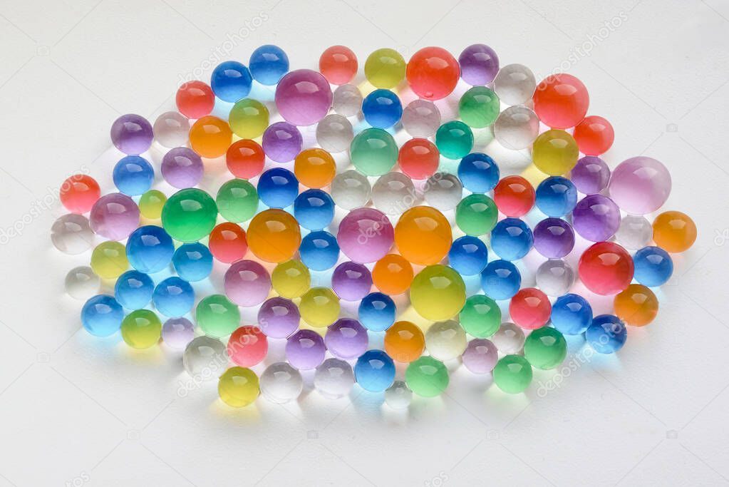 Balls of colored polymer gel, hydrogel beads. Water absorbent