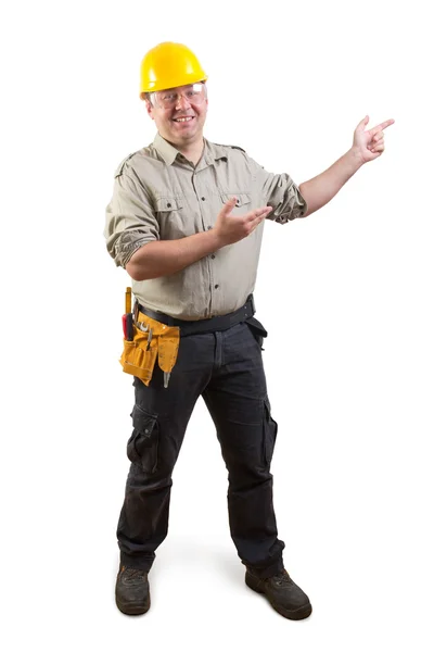 Sonriente trabajador con gesto de presentación, recorte camino incluido — Foto de Stock