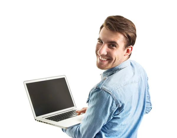 Young man holding laptop Royalty Free Stock Images