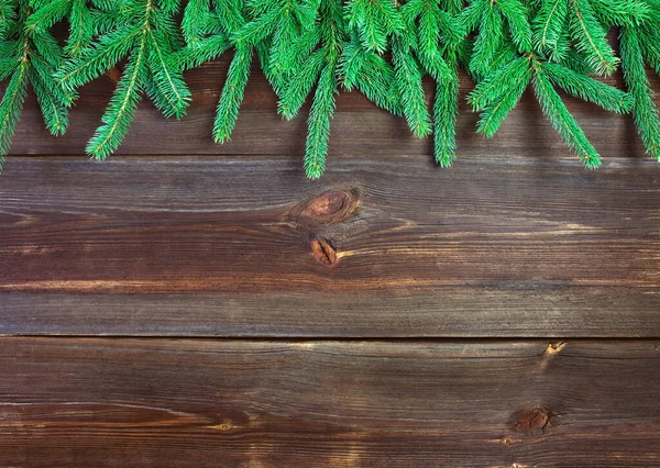 Tannenzweige Auf Rustikalen Holzplanken Weihnachtlicher Hintergrund Blick Aus Dem Hochwinkel — Stockfoto