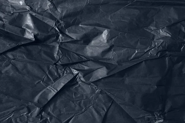 Czarny zgnieciony tło tekstury papieru — Zdjęcie stockowe