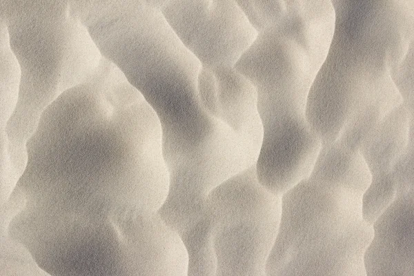 Κοντινό πλάνο άμμο στην παραλία υφή φόντου — Φωτογραφία Αρχείου
