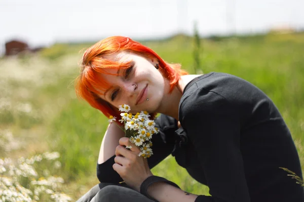 Menina bonita em flores — Fotografia de Stock