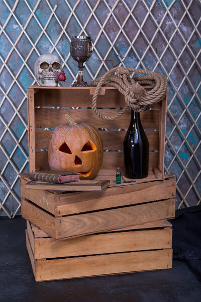 Pumpkin and scull on box