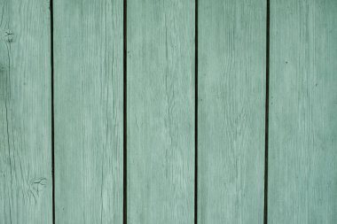 Nane rengine boyanmış tahtalardan yapılmış doğal ahşap zemin. Ahşap yüzeyler için boya